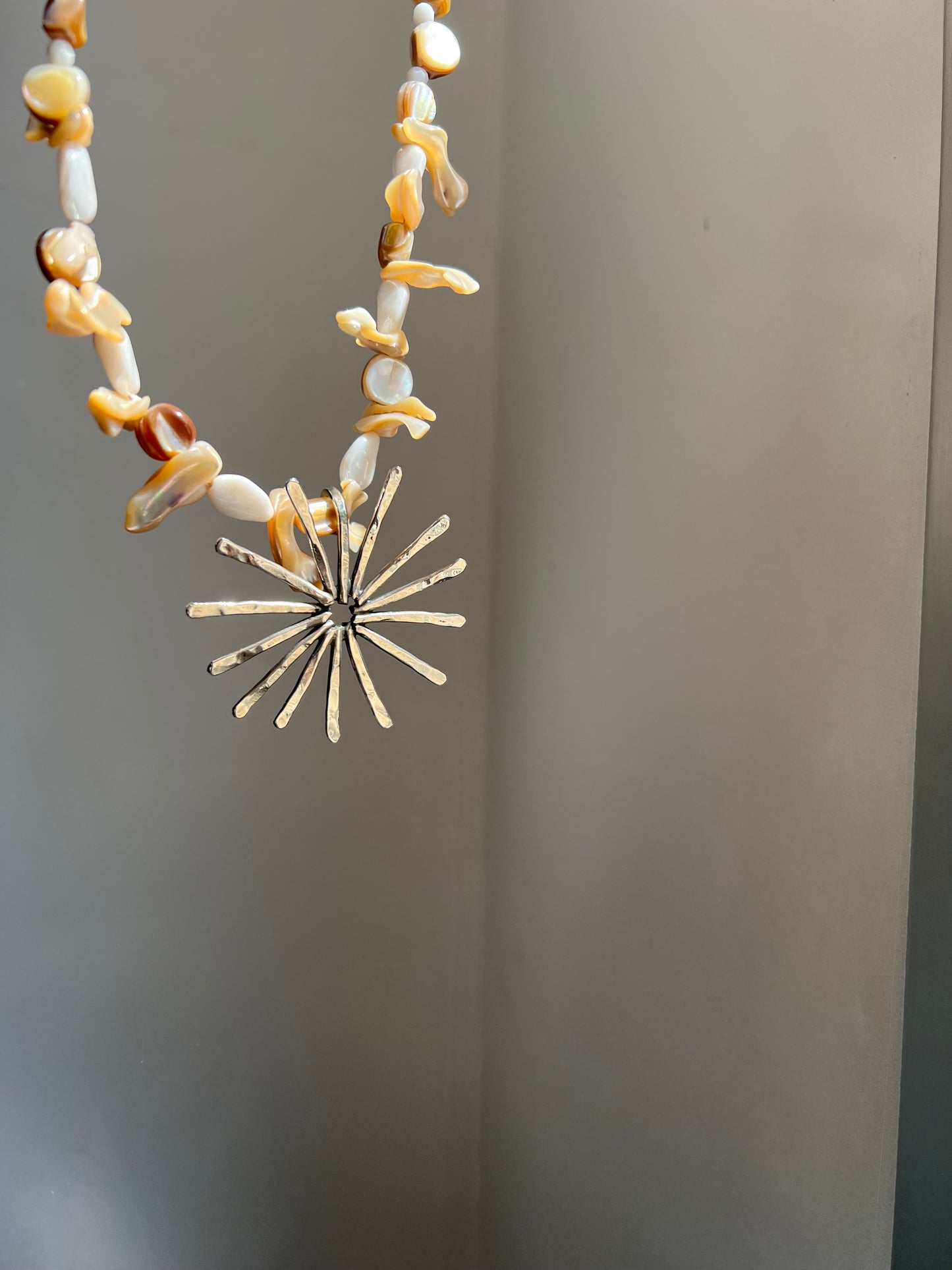 Sol chico con nácar